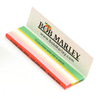 Bob Marley King Rolling Paper in official packaging, featuring 33 extra long leaves made of pure hemp paper. Available at Curat Cart.