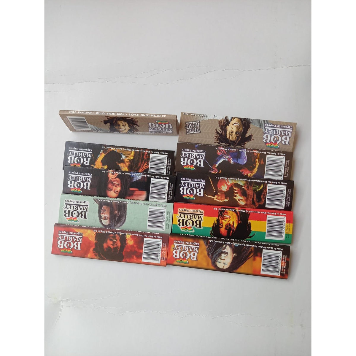 Explore high-quality Bob Marley King Rolling Paper in official packaging, available at Curat Cart for premium smoking experiences.
