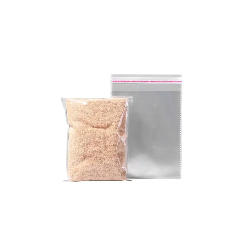 High-quality clear plastic bags for packaging, perfect for organizing and protecting products. Available at Curat Cart.