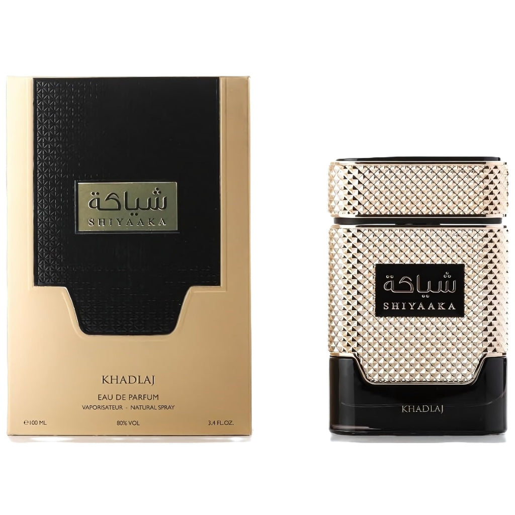 Khadlaj Shiyaaka Snow perfume displays elegant packaging with a textured gold and black design, 3.4 fl oz.