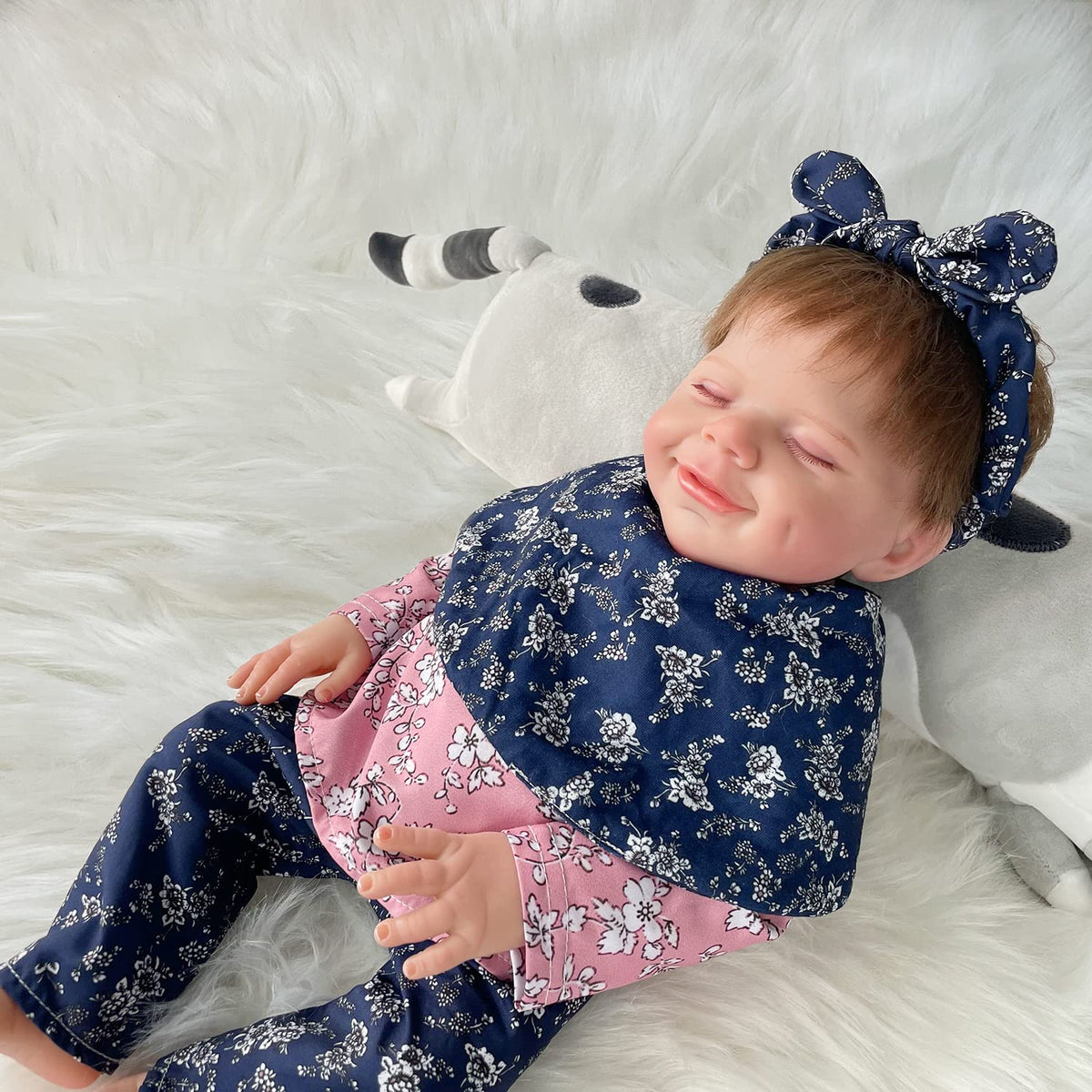 Explore our 18" lifelike reborn baby doll, realistically designed and verified by CuratCart for quality assurance.
