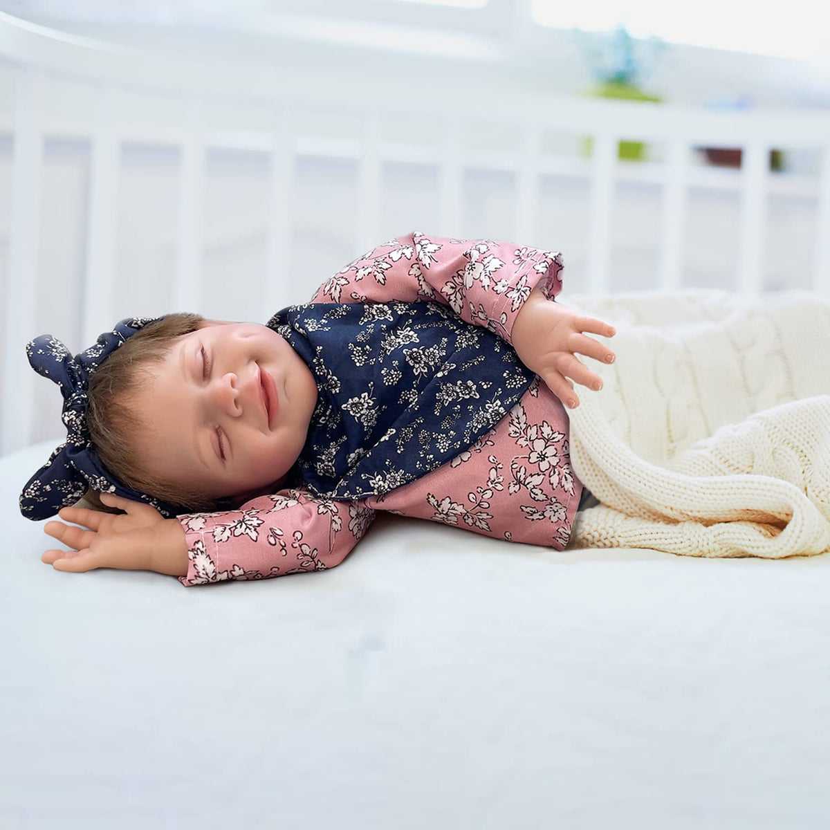 Premium imported 18" lifelike reborn baby doll, dressed in floral attire, perfect for kids' imaginative play.