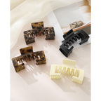 Set of four hat-friendly claw clips in various colors. Order online now and accessorize your baseball cap! Available for quick delivery.