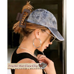 Authentic hat-friendly claw clip for secure hair hold, ideal for wearing with a baseball cap. Perfect for stylish convenience.