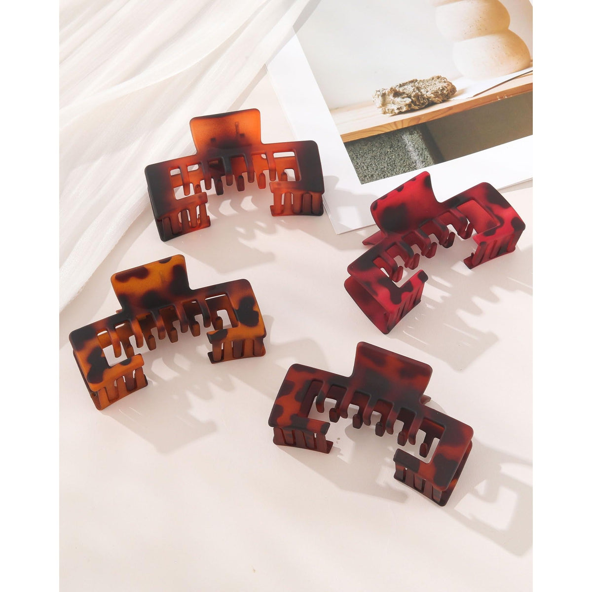 Set of four trendy claw clips designed for baseball caps. Durable, stylish, and Verified by CuratCart.