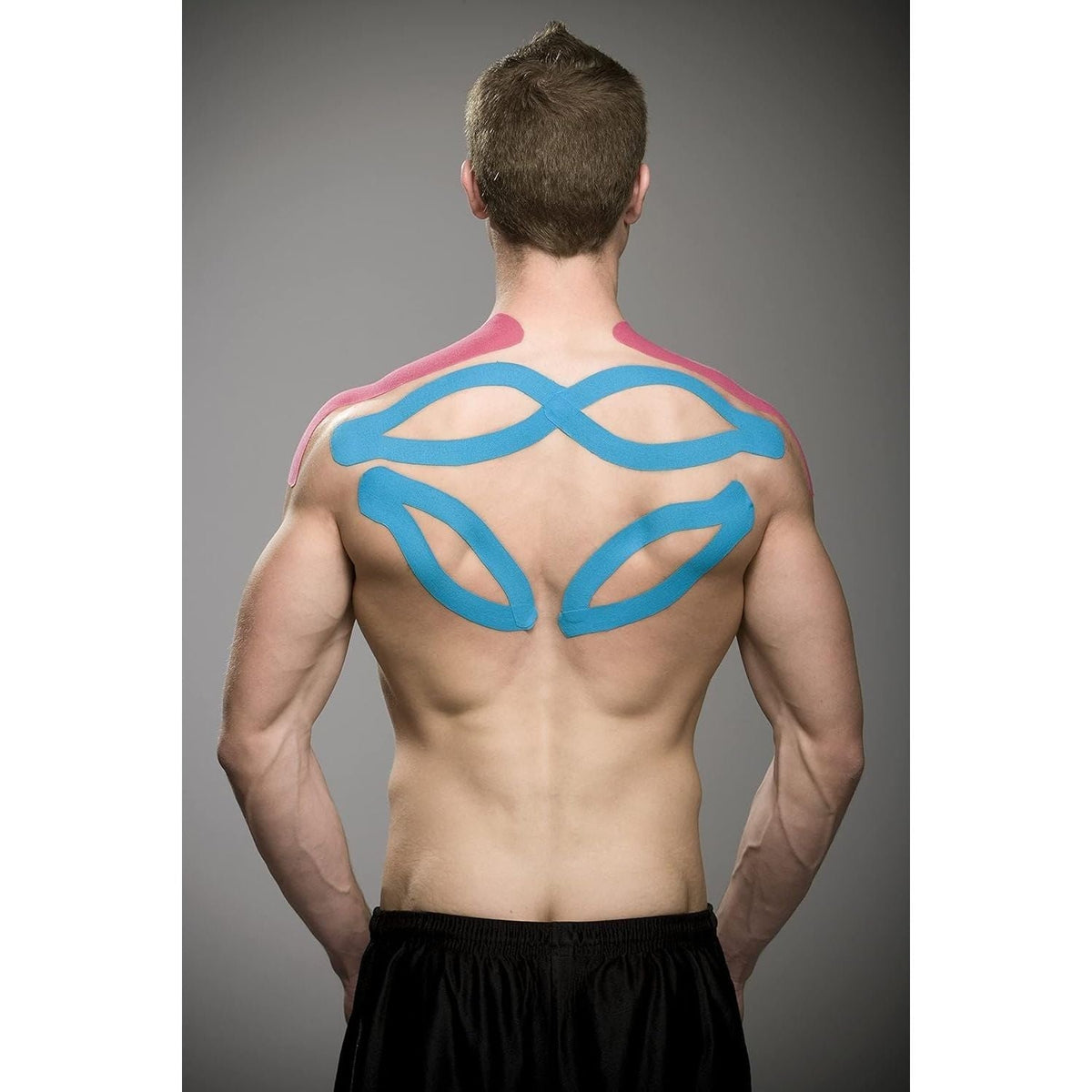 Kinesio Tex Classic W/R tape applied on a man's back. Available in India, order online for effective support.