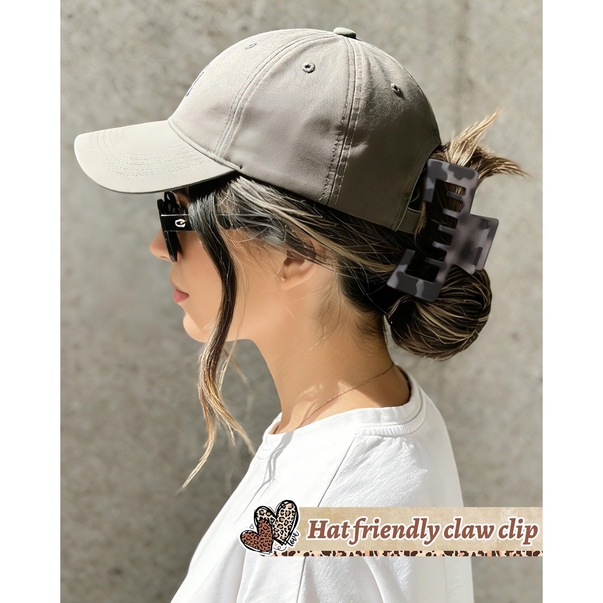 A stylish woman in a baseball cap using a hat-friendly claw clip to secure her hair, ensuring comfort and style. Verified by CuratCart.