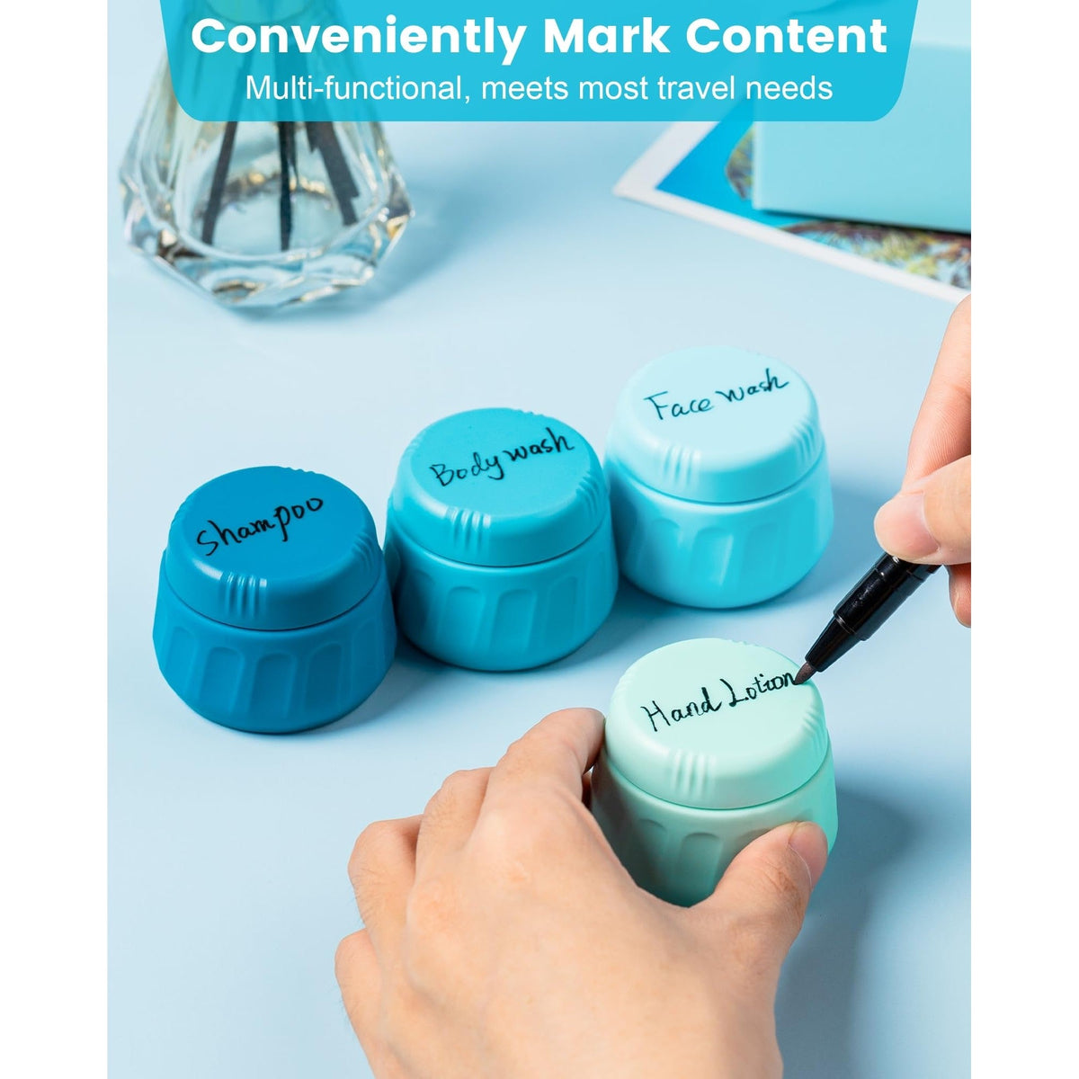 Four labeled travel containers for toiletries in blue colors. Ideal for travel; order online for convenience.