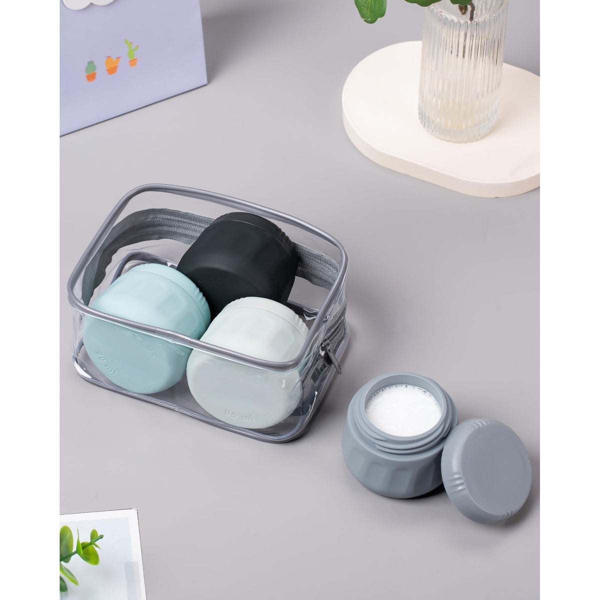 Set of Mrsdry travel containers in a clear case, perfect for toiletries. Premium global favorite, ideal for organized travel.