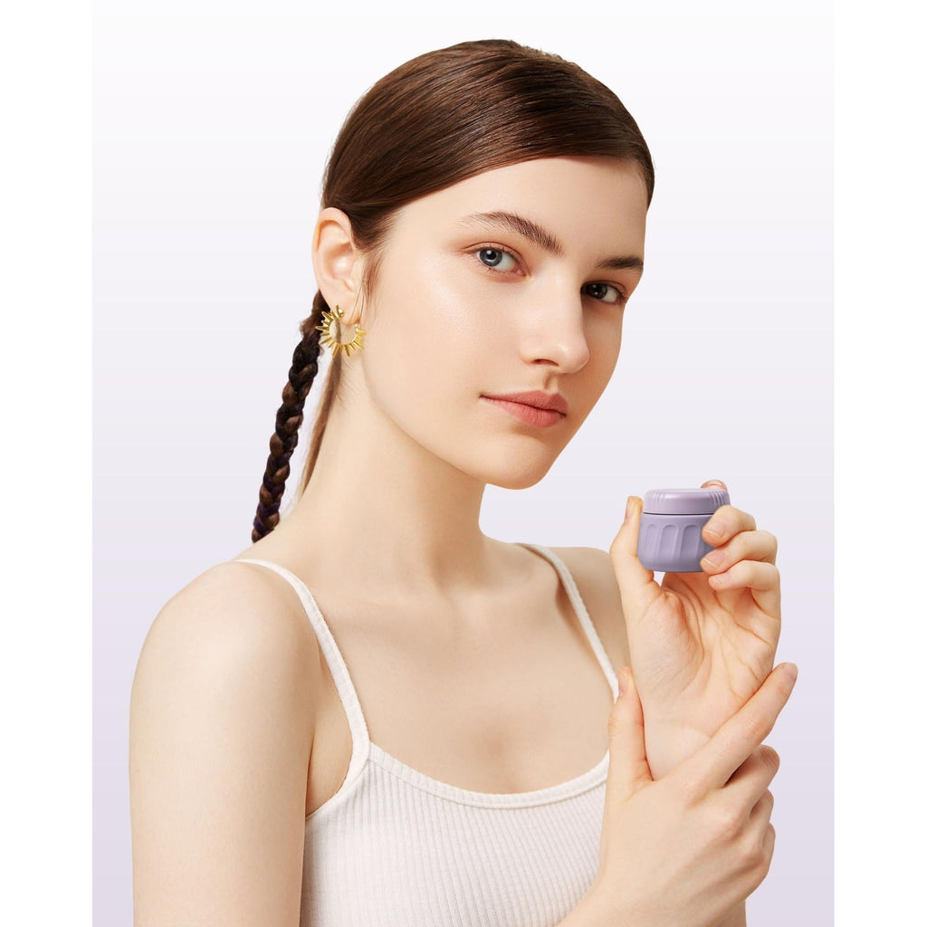 Compact Mrsdry travel container for toiletries held by a model. Available online for convenient travel organization.