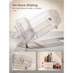 Transparent rotating makeup organizer with non-slip bottom, showcasing various compartments for beauty products.