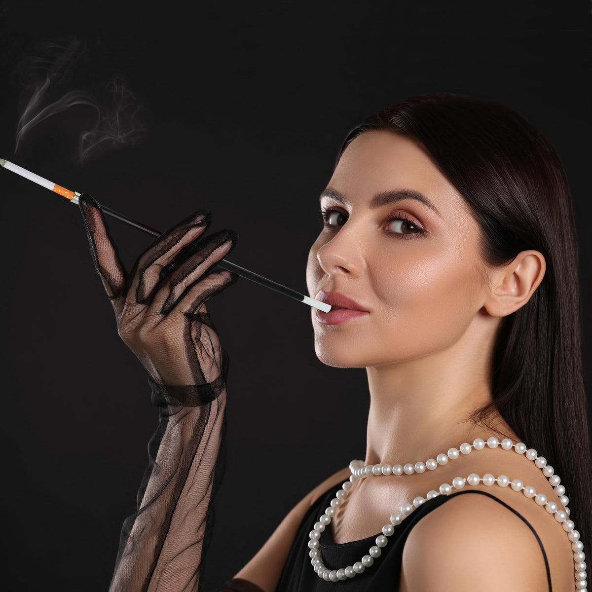 Elegant 4E's Novelty Cigarette Holders showcased in high-quality finish, available at Curat Cart for a sophisticated touch.
