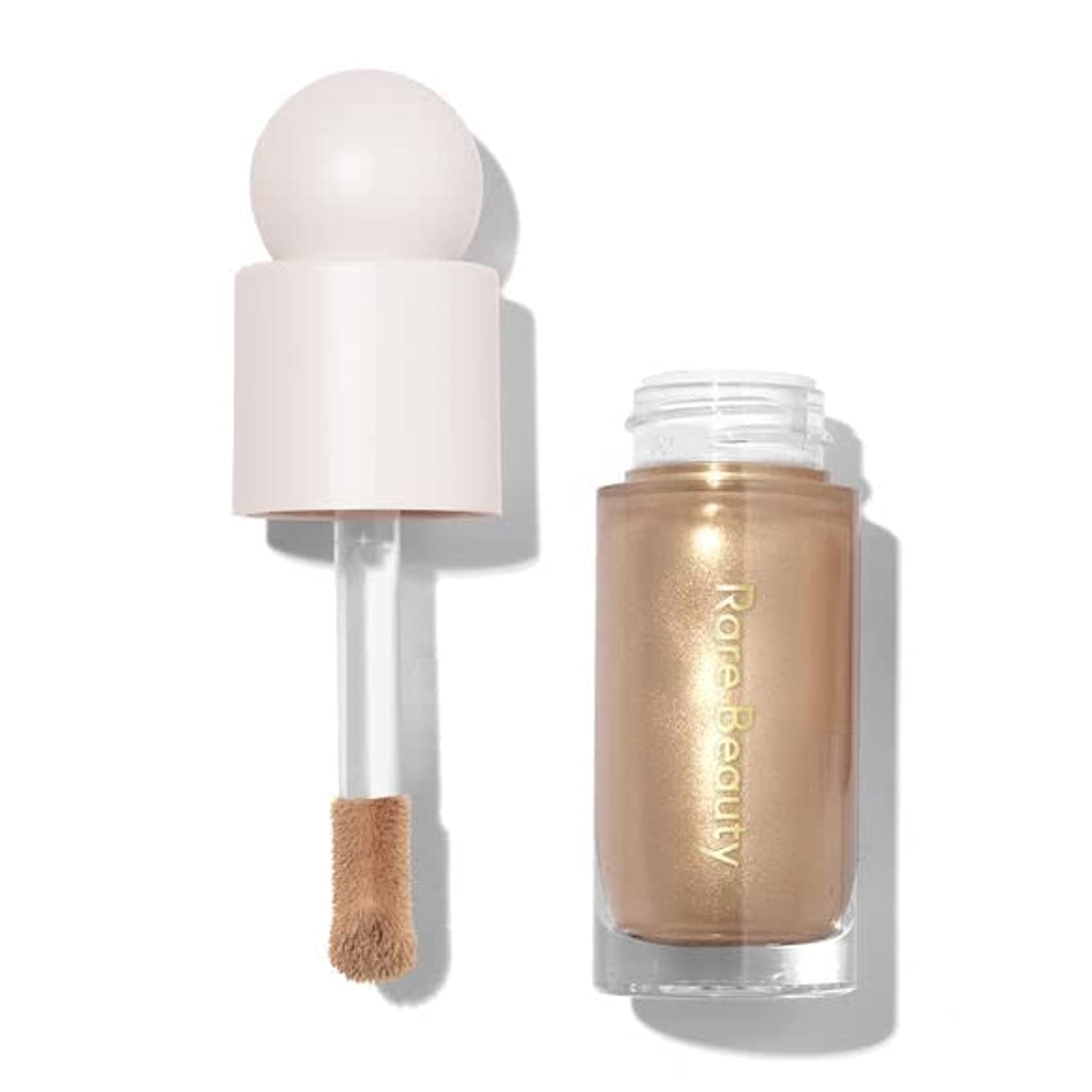 Buy now Rare Beauty by Selena Gomez Positive Light Liquid Luminizer Highlight - Enlighten - Champagne 0.5 Fl Oz (Pack of 1) Bronze,Gold,White at indiglob india