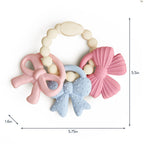 Itzy Ritzy Silicone Teether Trio, Textured Baby Teething Toys Rings (Bows)