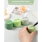 Set of four labeled travel containers for toiletries, showcasing lotion, body wash, shampoo, and cream.