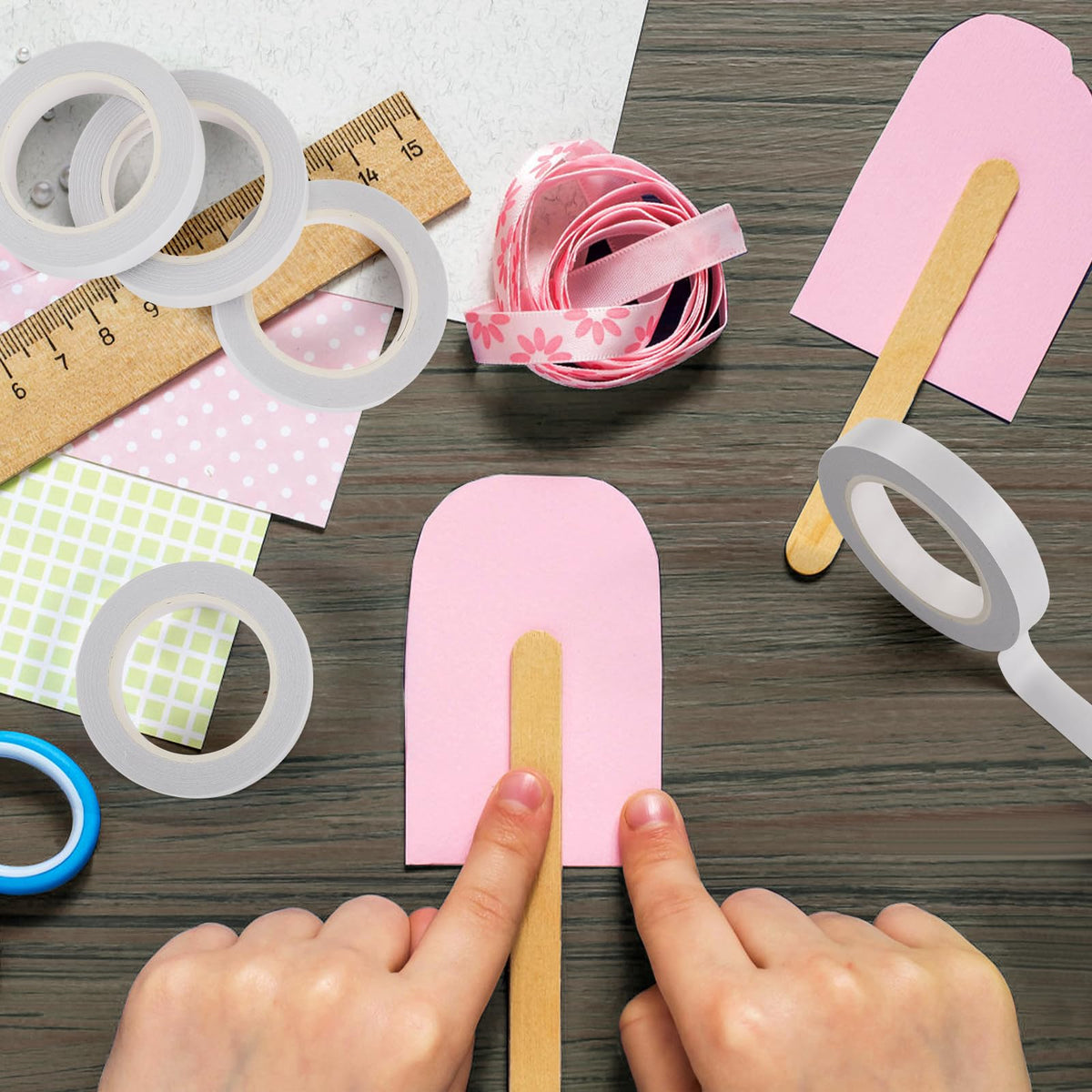 Double sided tape for crafts showcased with various materials, perfect for DIY projects. Available at Curat Cart, 100% Authentic.