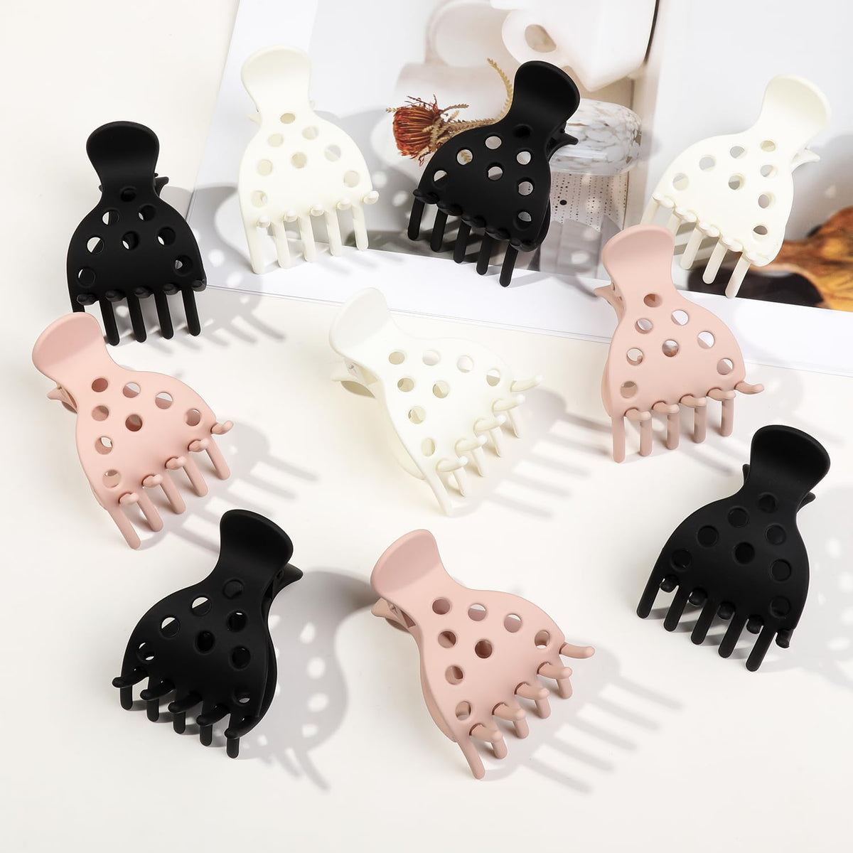 Premium imported set of 10 Root Clips for Curly Hair in black, white, and pink. Ideal for adding volume and securing curls.