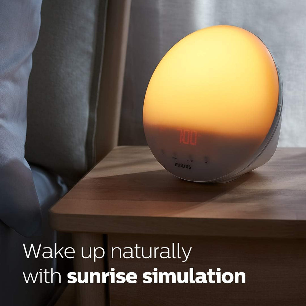 Buy now Philips SmartSleep Wake-up Light, Colored Sunrise and Sunset Simulation, 5 Natural Sounds, FM Radio & Reading Lamp, Tap Snooze, HF3520/60 at indiglob india