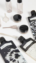 Buy now Kitsch 11 PCS Travel Bottles for Toiletries â€“ Travel Essentials Kit for Shampoo, Conditioner, Lotion & More - TSA Approved Travel Bottles, Leak-Proof Refillable Travel Size Containers - Black & Ivory at indiglob india
