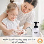 Flowcheer Foaming Hand Soap refill on a table, as a mother and child happily wash hands together, promoting fun and cleanliness.