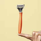 Harry's Original Shaving Kit for Men - Razor Handle, 15 Razor Blade Refills, and Travel Blade Cover - German Engineered - Orange