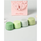 Set of four vibrant Mrsdry travel containers for toiletries. Available in India. Order online for easy organization.