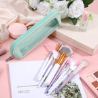 Aqua small makeup bag made of PU leather, showcasing makeup brushes, nail polish, and a soft floral background. Verified by CuratCart.