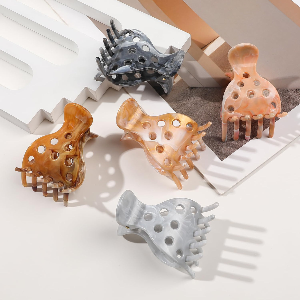 Set of 10 premium imported hair volume clips in various colors for enhancing curly hairstyles, showcasing a stylish design.