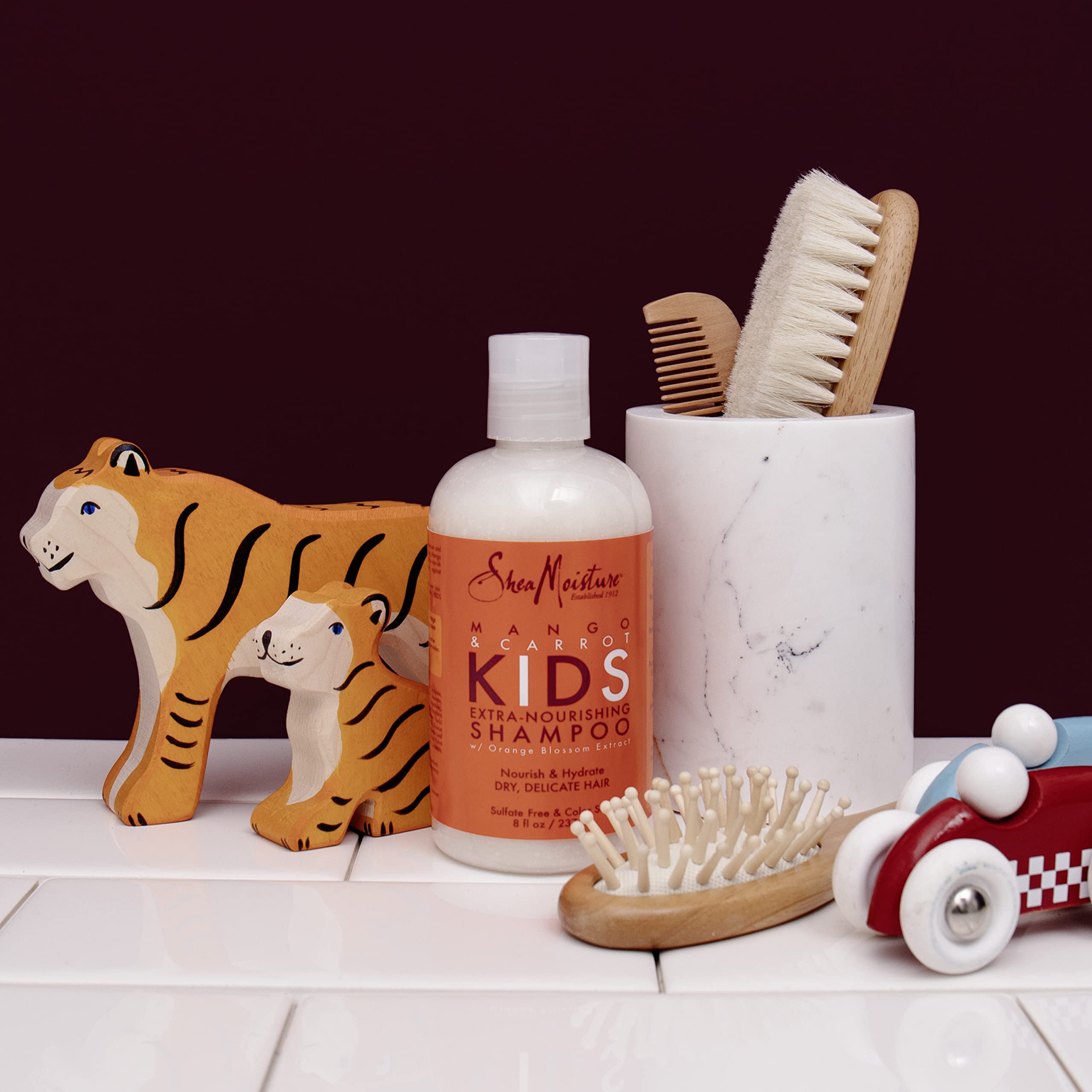 Shea Moisture Kids Shampoo Mango & Carrot Extra Nourishing 8oz | For all kids - gently cleanse, nourish, and detangle curly hair with Mango Butter, Carrot Oil, and Shea Butter.