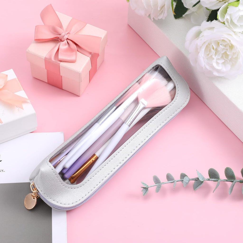 Authentic Psyqtsuary small clear makeup bag in PU leather, showcasing brushes inside, perfect for organizing beauty essentials.