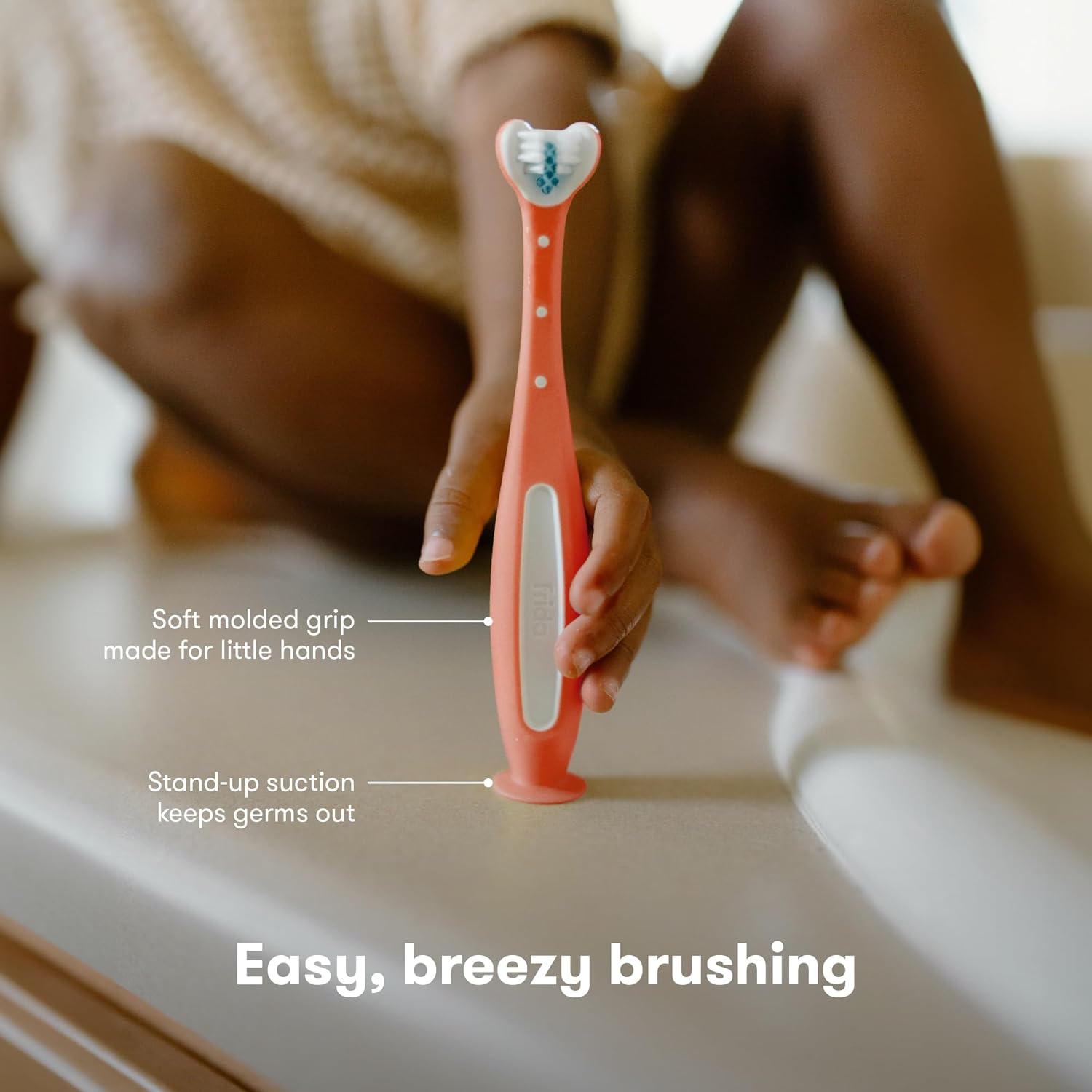 Buy now Frida Baby Triple-Angle Toothhugger Training Toddler Toothbrush | Toddler Toothbrush 2 Years and Up, Cleans All Sides at Once | Pink at indiglob india
