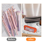Psyqtsuary small clear makeup bag in vibrant orange, showing organized makeup brushes and tools elegantly displayed.
