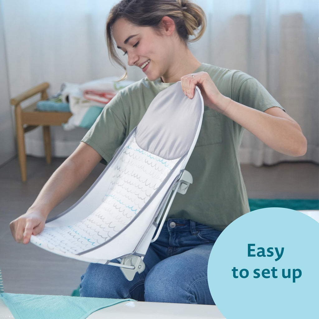 The First Years Sure Comfort Folding Baby Bather - Foldable Baby Bath Seat and Lounger for Home or On the Go - for Sink or Tub Use - Non-Slip Seat - For Up to 15 Lbs