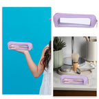 Trendy small clear makeup bag in lavender with a zipper, ideal for organizing cosmetics at home or on the go.