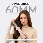 Stylish 4-in-1 travel dual voltage hair dryer brush for soft curls and volume, featuring a 60mm oval design.