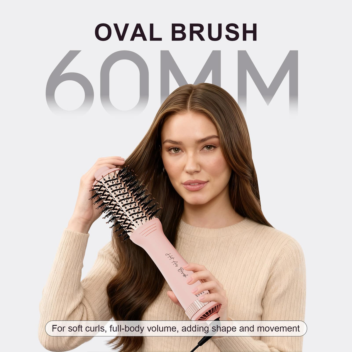 Stylish 4-in-1 travel dual voltage hair dryer brush for soft curls and volume, featuring a 60mm oval design.