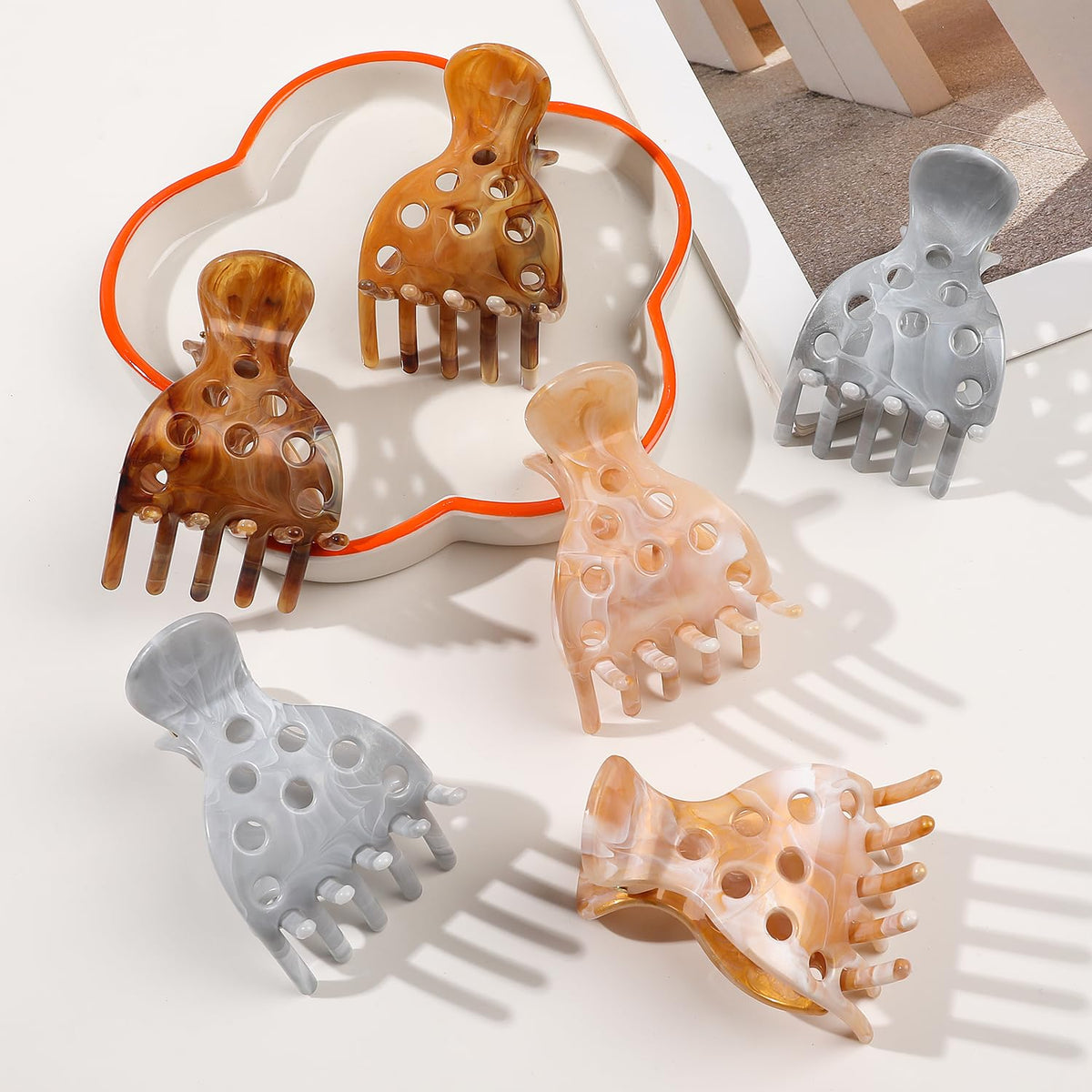 Set of 10 root clips in various colors, perfect for adding volume to curly hair. Verified by CuratCart for quality.