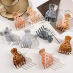 Set of 10 stylish hair volume clips in various colors and designs, perfect for enhancing curly hairstyles and adding lift.