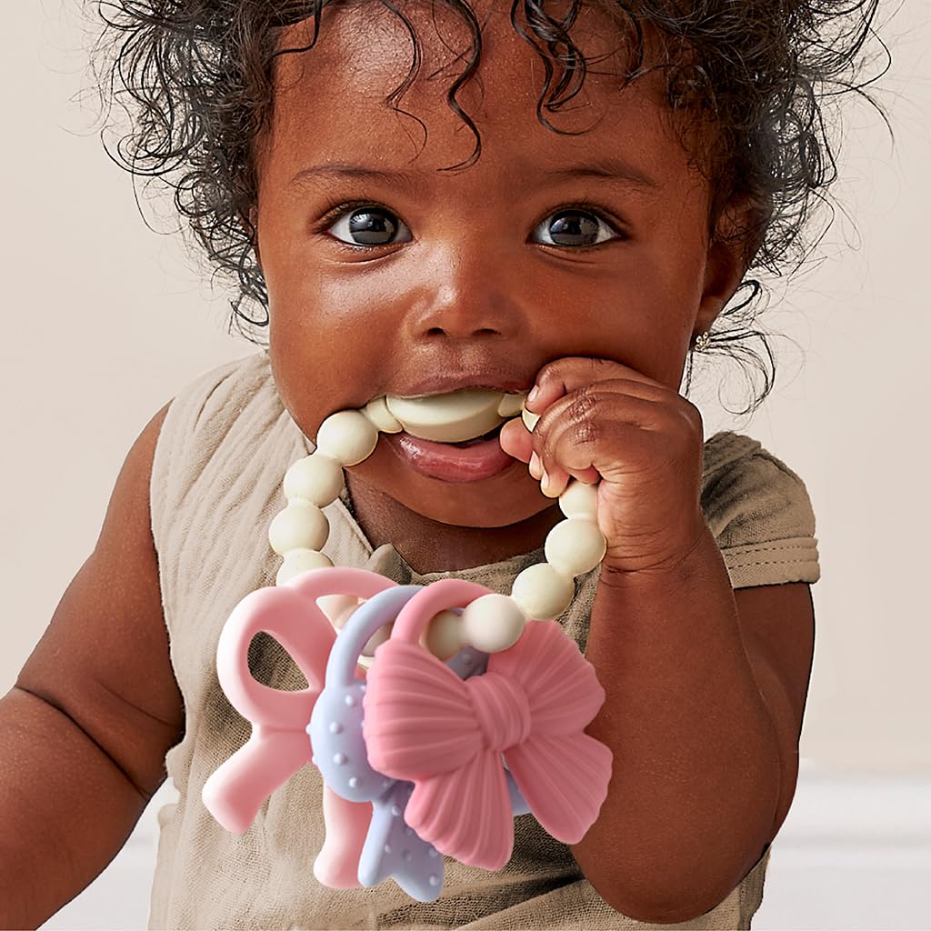 Itzy Ritzy Silicone Teether Trio, Textured Baby Teething Toys Rings (Bows)