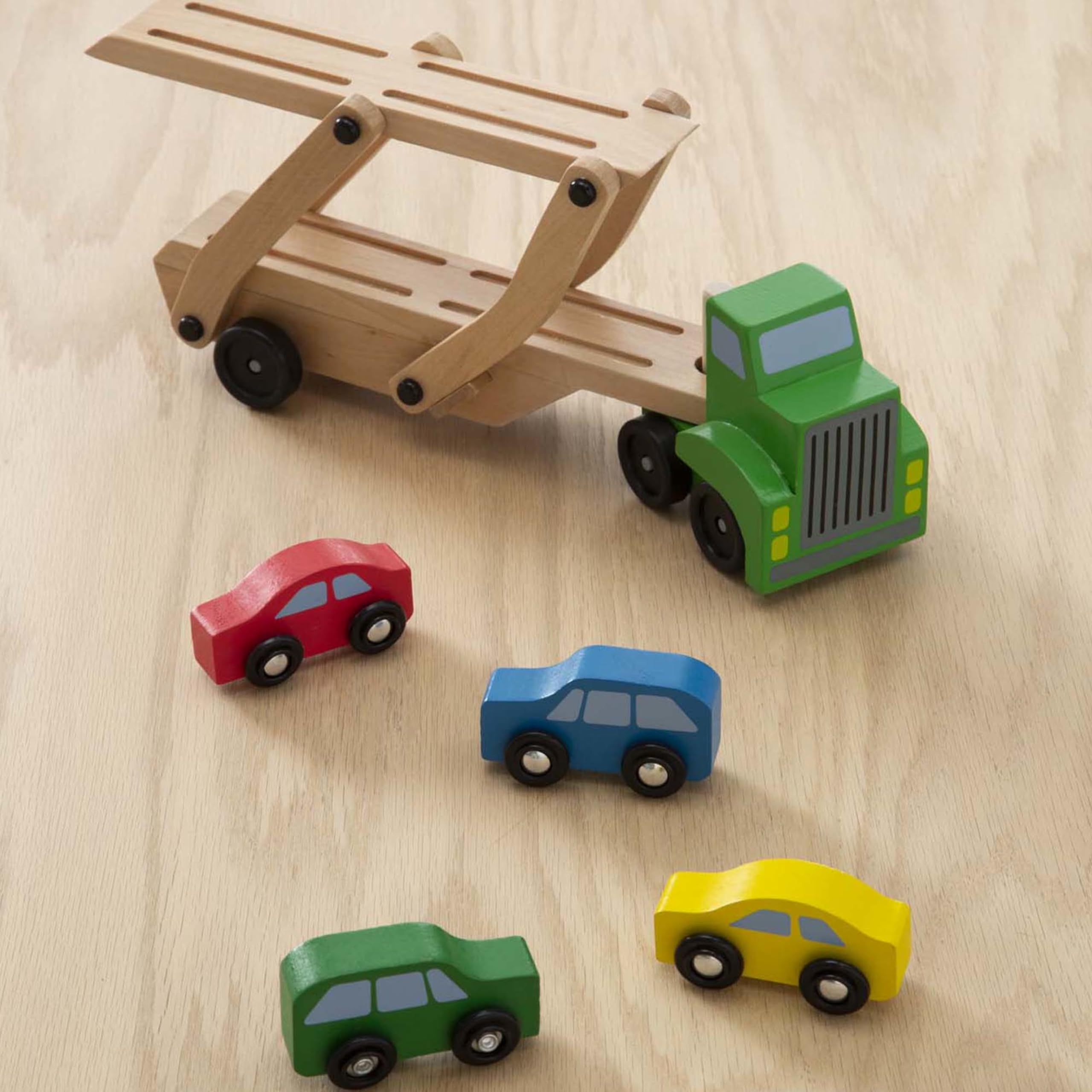 Buy now Melissa & Doug Car Carrier Truck and Cars Wooden Toy Set with 1 Truck and 4 Cars 5.75" x 12" x 3" at indiglob india