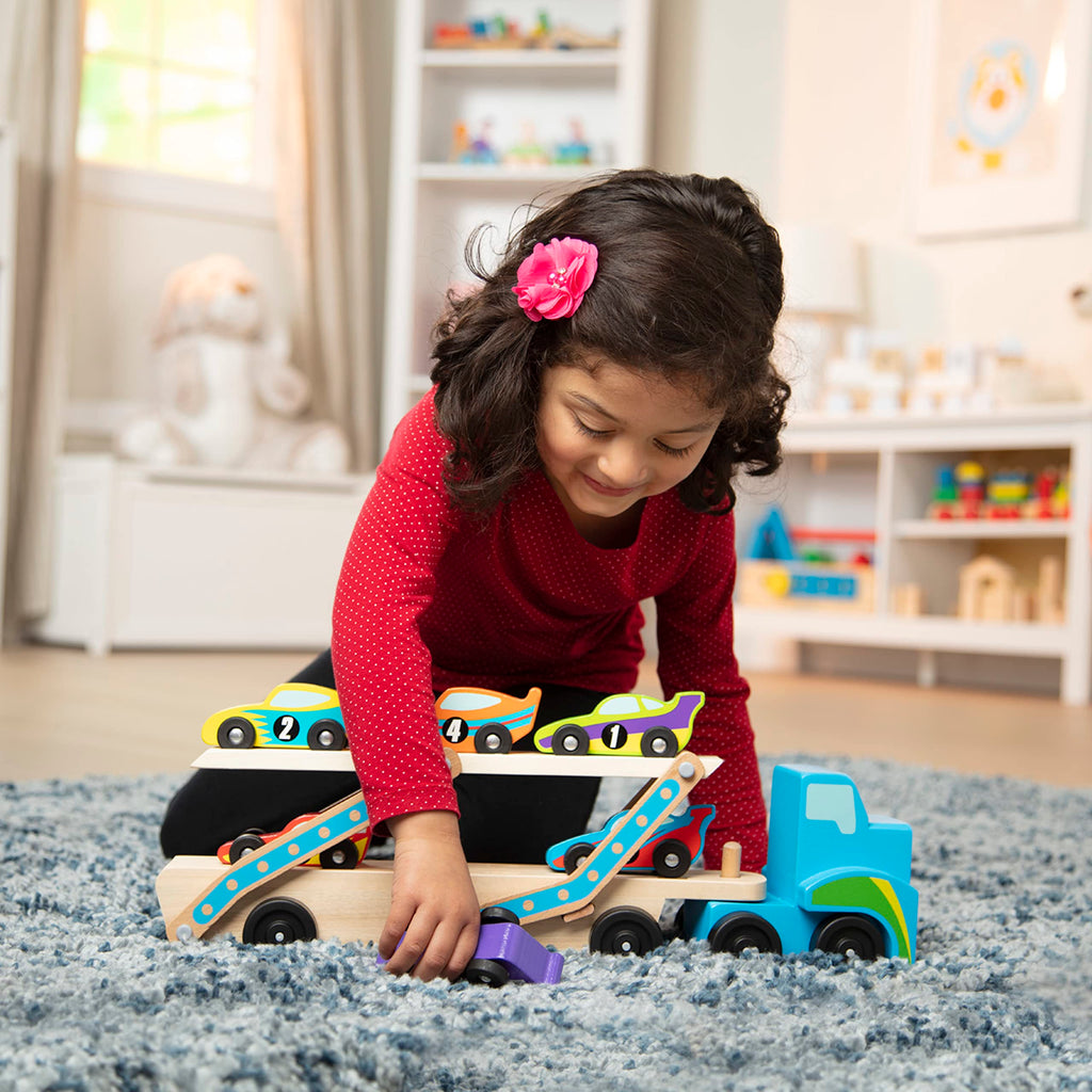 Buy now Melissa & Doug Mega Race-Car Carrier - Wooden Tractor and Trailer with 6 Unique Race Cars at indiglob india