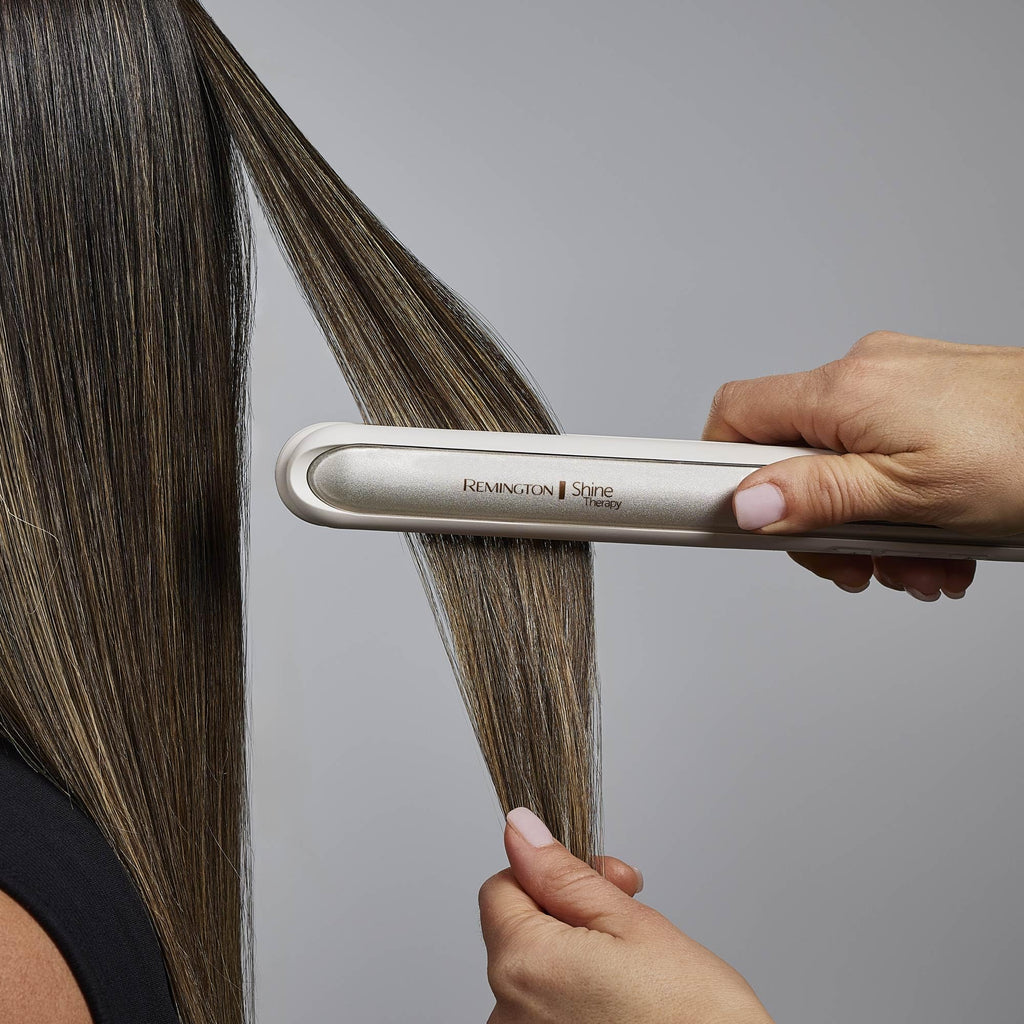 Remington Shine Therapy 1 Inch Hair Straightener, Argan Oil & Keratin | Keratin ceramic plates deliver smooth results; this flat iron reduces frizz for ideal hair styling.