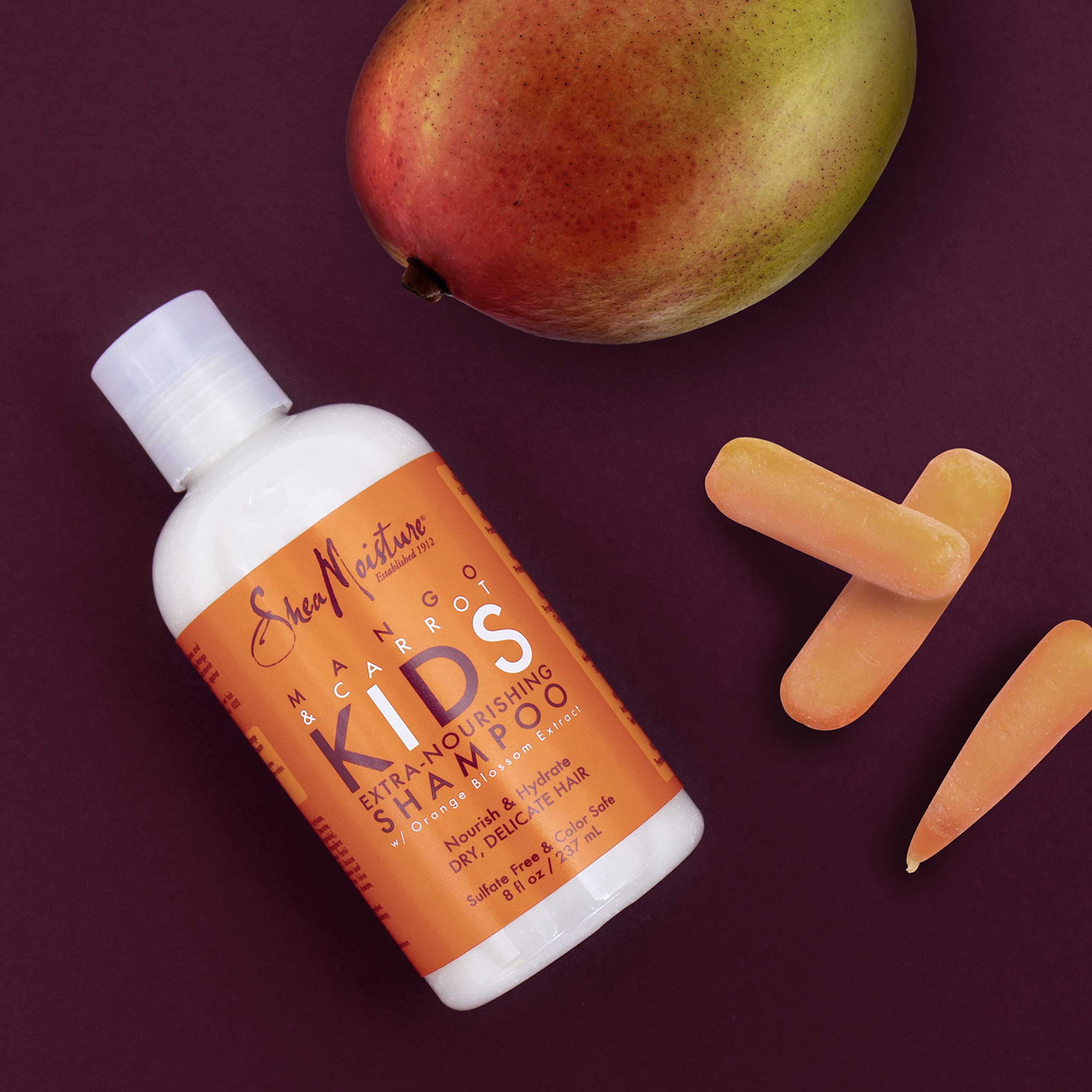 Shea Moisture Kids Shampoo Mango & Carrot Extra Nourishing 8oz | For all kids - gently cleanse, nourish, and detangle curly hair with Mango Butter, Carrot Oil, and Shea Butter.
