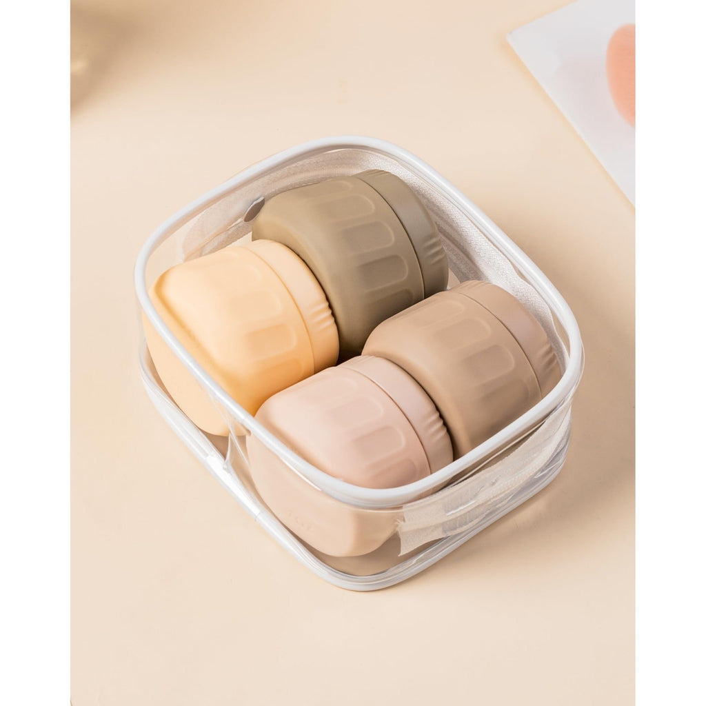 Authentic Mrsdry travel containers for toiletries in a transparent case, including four discreet colors. Perfect for organized travel.
