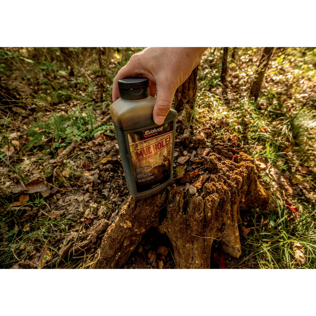Evolved Habitats Mudhole Molasses Enriched Liquid Deer Mineral Attractant - Powerful Ready-to-Use Year-Round Beneficial Food Supplement for Deer - 40 Oz Brown