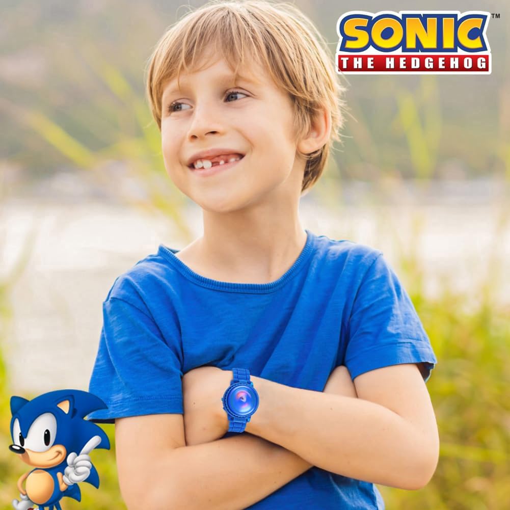 A happy boy in a blue shirt proudly wears an Accutime Sonic the Hedgehog watch. Verified by CuratCart for quality assurance.