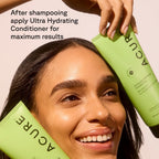 Bright green tube of Acure Curiously Clarifying Shampoo held by a smiling woman. Verified by CuratCart for quality assurance.