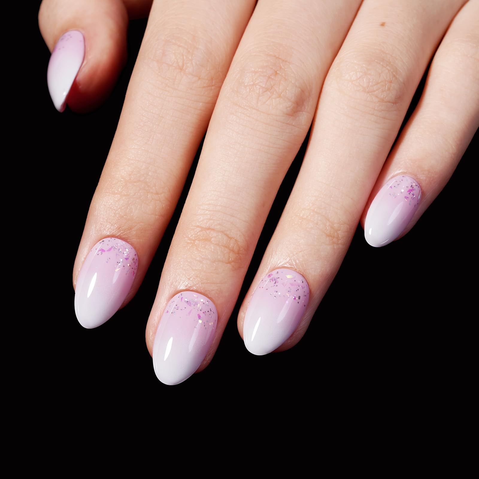 AILLSA Short Almond Nail Tips 450PCS in a stylish display, featuring a beautiful ombre design with sparkle, 100% authentic.