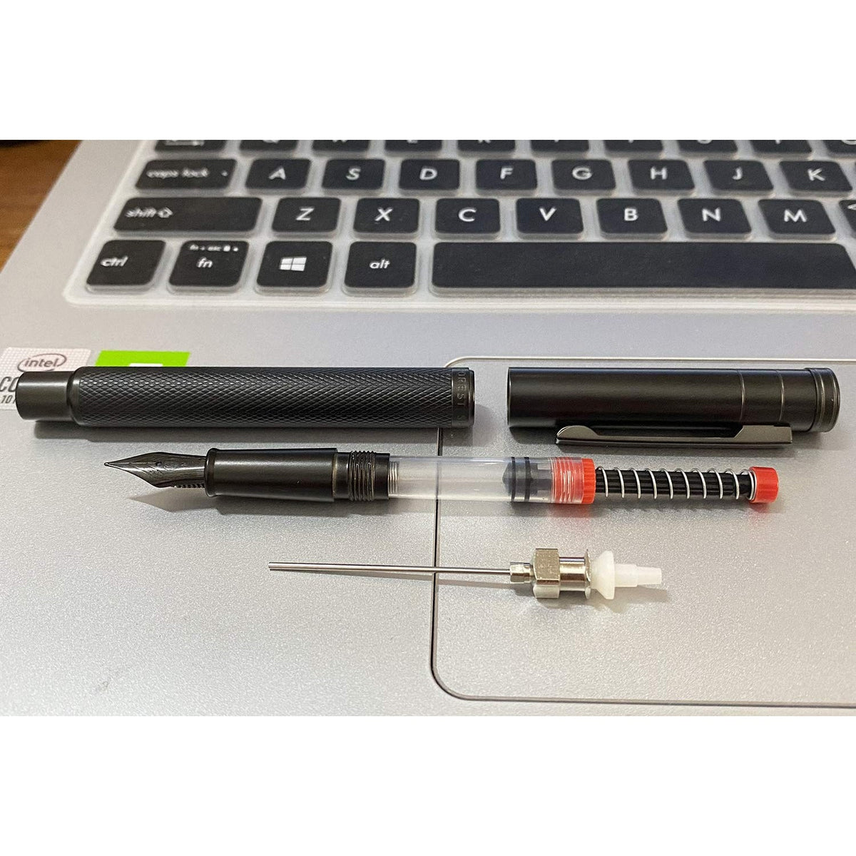 Explore the Asvine Fountain Pen Ink Filler, 100% Authentic and available at Curat Cart for premium writing experiences in India.
