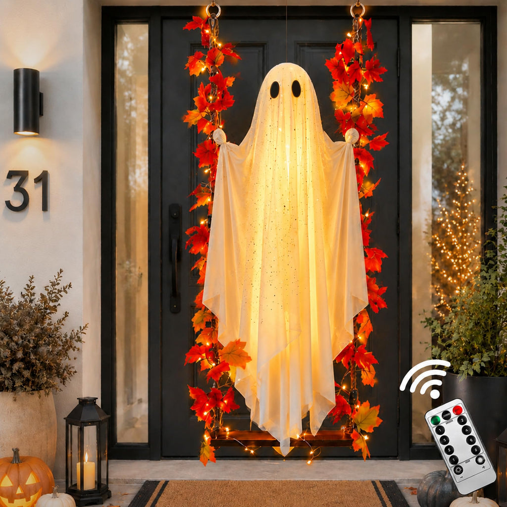 Premium imported Hanging Ghost Decor with Swing, enhanced by autumn leaves, perfect for festive occasions. Available at Curat Cart.